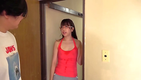 Asian chick gets banged by a strap-on